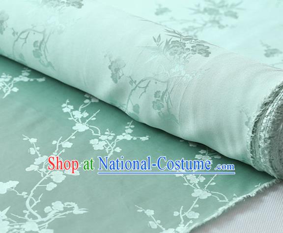 Chinese Light Green Silk Drapery Traditional Classical Plum Orchid Bamboo Pattern Satin Fabric Cheongsam Cloth