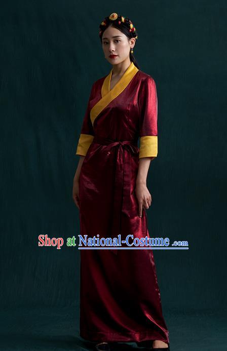 China Traditional Tibetan Ethnic Woman Clothing Zang Nationality Kangba Wine Red Bola Dress