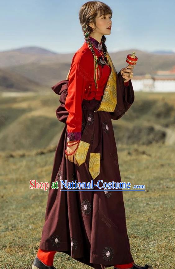 China Traditional Xizang Minority Young Lady Wine Red Tibetan Robe Zang Nationality Folk Dance Clothing