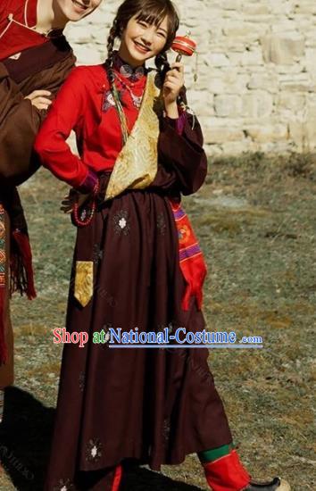 China Traditional Xizang Minority Young Lady Wine Red Tibetan Robe Zang Nationality Folk Dance Clothing