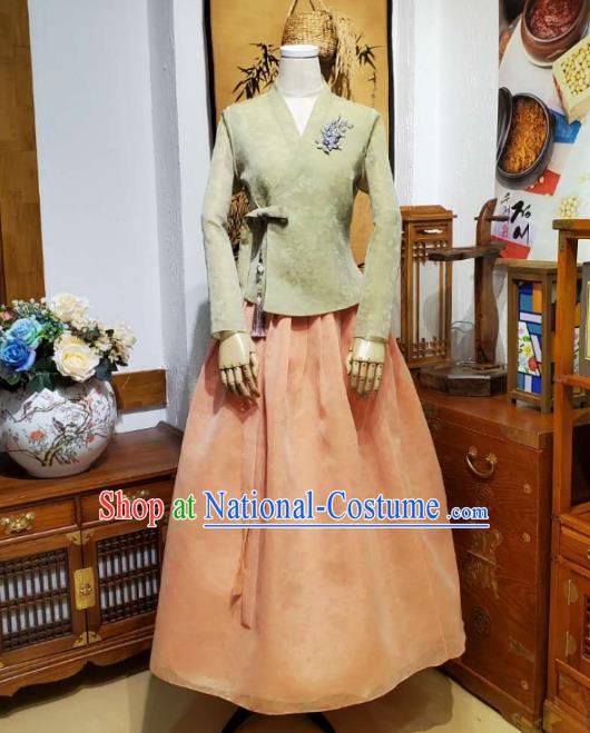 Korean Women Apparels Light Green Blouse and Orange Skirt Asian Korea Fashion Traditional Hanbok Costumes