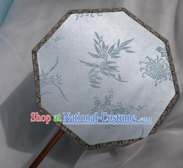 China Classical Plum Orchids Bamboo Chrysanthemum Pattern Palace Fan Traditional Hanfu Fan Handmade Blue Silk Octagon Fan